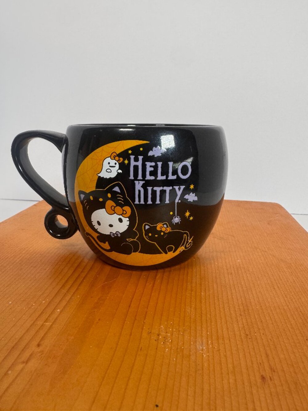 Sanrio Halloween Hello Kitty black ceramic loop handle mug